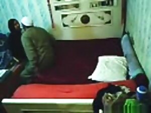 tapes an arab hijab girl having missionary sex with a guy on the bed